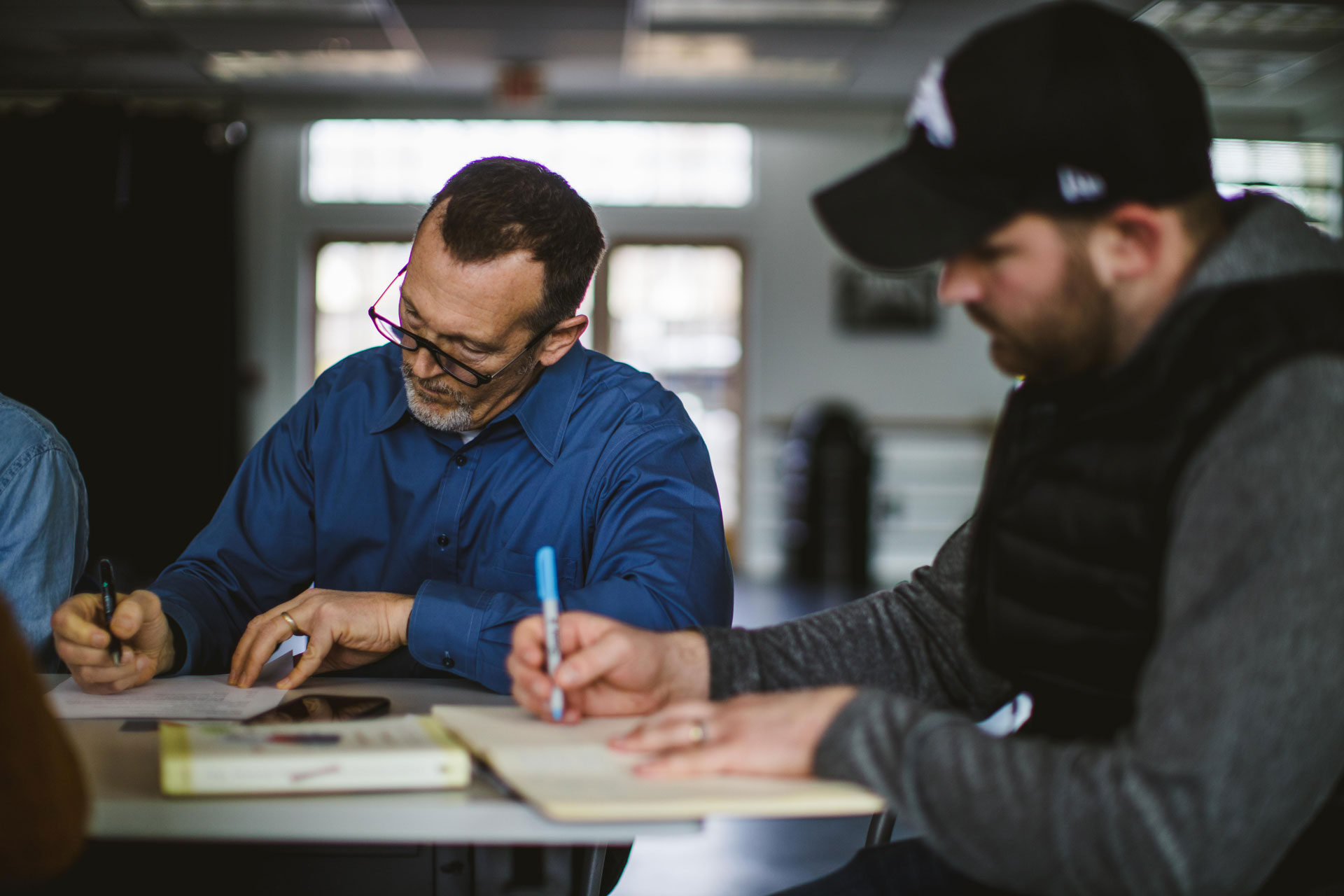 Image of team meeting completing consulting wish list at Inzet